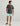 Huk men's KC Americana Tee in Dark Shadow, moisture-wicking short-sleeve fishing t-shirt, back view