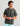 Huk men's KC Americana Tee in Dark Shadow, quick-drying short-sleeve fishing t-shirt, side view