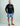 Huk men's Pursuit Performance Crew in Black, breathable performance fishing shirt, front view, alternate angle
