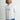 Huk men's Pursuit Performance Hoodie in White, UPF 50+ sun protection long-sleeve fishing hoodie, front view