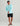 Huk men's Pursuit Performance Hoodie in Caicos, breathable long-sleeve fishing hoodie, back view