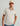Huk men's Airweight Performance Polo in Seagull Heather, antimicrobial short-sleeve performance fishing shirt, front view, alternate angle