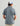 Huk men's Airweight Performance Polo in Stormy Blue Heather, antimicrobial short-sleeve performance fishing shirt, side view