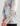 Gray and white marbled crew neck long-sleeve shirt with orange text and branding on chest and sleeve.