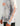 HLK performance hoodie in white and gray camo with orange text branding on chest and sleeve.