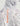 Gray and white camo hoodie with orange "Huk Fishing" text printed vertically on back.