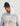 White and gray camouflage hoodie with attached hood, orange "HUK" branding on chest, worn with black baseball cap.