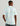 Huk men's Airweight Performance Polo in White Palm Craze, antimicrobial short-sleeve performance fishing shirt, side view