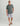 Huk men's KC Print Pursuit Performance Polo in Volcanic Ash Mini Fish, antimicrobial performance fishing shirt, front view, alternate angle