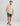 Huk men's KC Airweight Performance Polo in Egret Estuary Camo, antimicrobial short-sleeve performance fishing shirt, back view