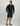 Huk men's A1A Performance Hoodie in Black, breathable long-sleeve fishing hoodie, back view