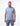 Man wearing light blue short-sleeve t-shirt with small chest logo and patterned navy shorts.