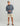 Huk men's Airweight Heather 1/4 Zip in Stormy Blue Heather, UPF 40+ sun protection fishing fleece, back view