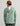 Huk men's Icon Performance Hoodie in Seagrass Camo, antimicrobial long-sleeve fishing hoodie, side view