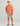 Huk men's Airweight Hoodie in Dusty Orange Heather, breathable long-sleeve fishing hoodie, back view