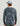 Blue camouflage printed hoodie with white collar trim, shown from back view on male model.