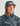 Navy camo hoodie with "HUK" text and matching baseball cap with hood attachment.