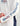 White long-sleeve crew neck shirt with blue and red HUK Fishing logo on chest and sleeve.