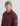Burgundy fleece shacket with button front, chest pockets, and collar worn with sage green knit beanie.