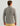 Man wearing gray lightweight fleece pullover with quarter-zip neckline and long sleeves, shown from back view.