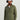 Sage green lightweight fleece with quarter-zip collar worn with white undershirt and light blue cap.