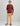 Burgundy heathered fleece hoodie with front kangaroo pocket and small chest logo worn with tan pants.