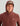 Man wearing burgundy heathered fleece hoodie with small white logo on chest and hood up.