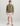 Olive green cotton fleece hoodie with Huk logo on chest, displayed on male model wearing cream shorts and brown slides.