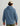 Blue cotton fleece hoodie with drawstring hood, shown from back view on model wearing khaki pants.