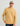 Tan terry hoodie with Huk logo on chest, kangaroo pocket, and drawstring hood.