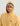 Pale yellow terry hoodie with "Huk" logo on chest, shown on model wearing gray and navy cap.
