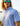 Huk men's KC Kona Button-Down in White Mini Marlin, quick-drying button-down fishing shirt, lifestyle photo on the water
