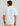 Man wearing light blue short-sleeve button-down shirt with textured fabric, shown from back view.