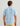 Man wearing light blue button-down shirt with dark blue fish print pattern, shown from back view.