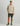 Huk men's Icon Button-Down in River Rock, moisture-wicking button-down fishing shirt, back view, alternate angle