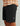 Huk men's Next Level 10.5-inch Short in Black, stain-release fishing shorts, fabric and stitching close-up