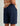 Huk men's Next Level 10.5-inch Short in Naval Academy, stretch fishing shorts, back view, alternate angle