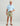 Huk men's Next Level 7-inch Short in Seagrass, stain-release fishing shorts, back view