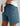 Huk men's Next Level 7-inch Short in Stormy Blue, stretch fishing shorts, side profile view