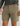 Khaki textured shorts with button closure and side pockets, paired with charcoal patterned long-sleeve shirt.