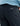 Black pants with multiple pockets and a woven label patch, worn with a light blue shirt.