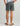 Huk men's Shoreside Short in Volcanic Ash, stretch fishing shorts, side profile view