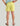 Huk men's Shoreside Short in Vintage Chartreuse, stretch fishing shorts, side profile view