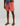 Huk men's Shoreside Short in Mineral Red, stain-release fishing shorts, front view, alternate angle