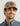Huk Leather Patch Trucker Hat in Dock, moisture-wicking mesh-back trucker hat, front view, alternate angle