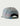Gray snapback hat with perforated vents, multicolored map print, and adjustable back strap with blue label.