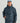 Man wearing HUK Men's Storm Printed 3-Layer Jacket in Sea Storm
