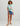 Huk women's Parrot Breeze Oversized Tee in Heron Blue, short-sleeve fishing t-shirt, back view