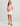Huk women's Raised on Waves Pocket Tee in Oleander, short-sleeve fishing t-shirt, back view