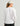 Huk women's Pursuit Performance Crew in White, stain-release long-sleeve performance fishing shirt, side view